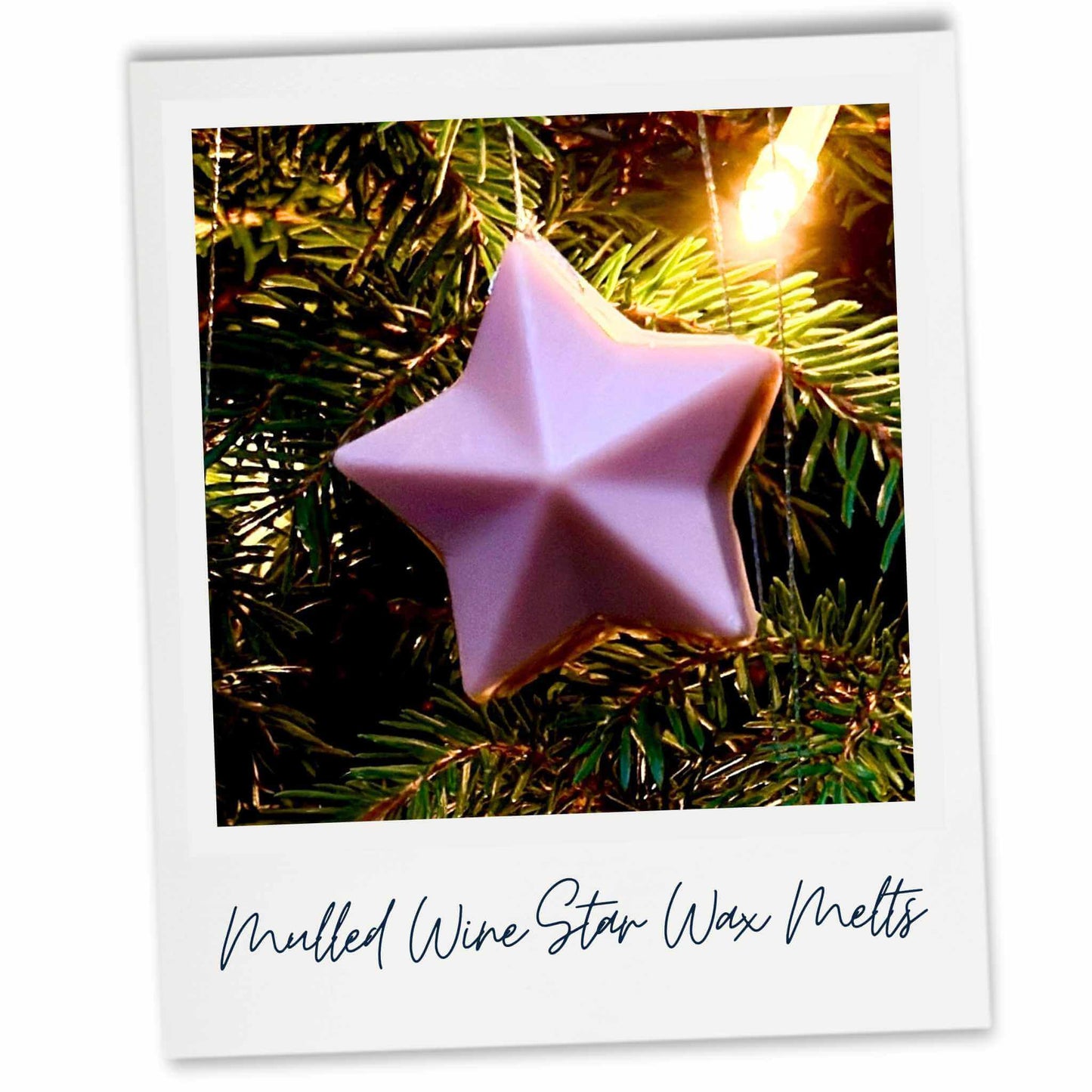 Mocha coloured star-shaped wax melt on a Christmas tree branch