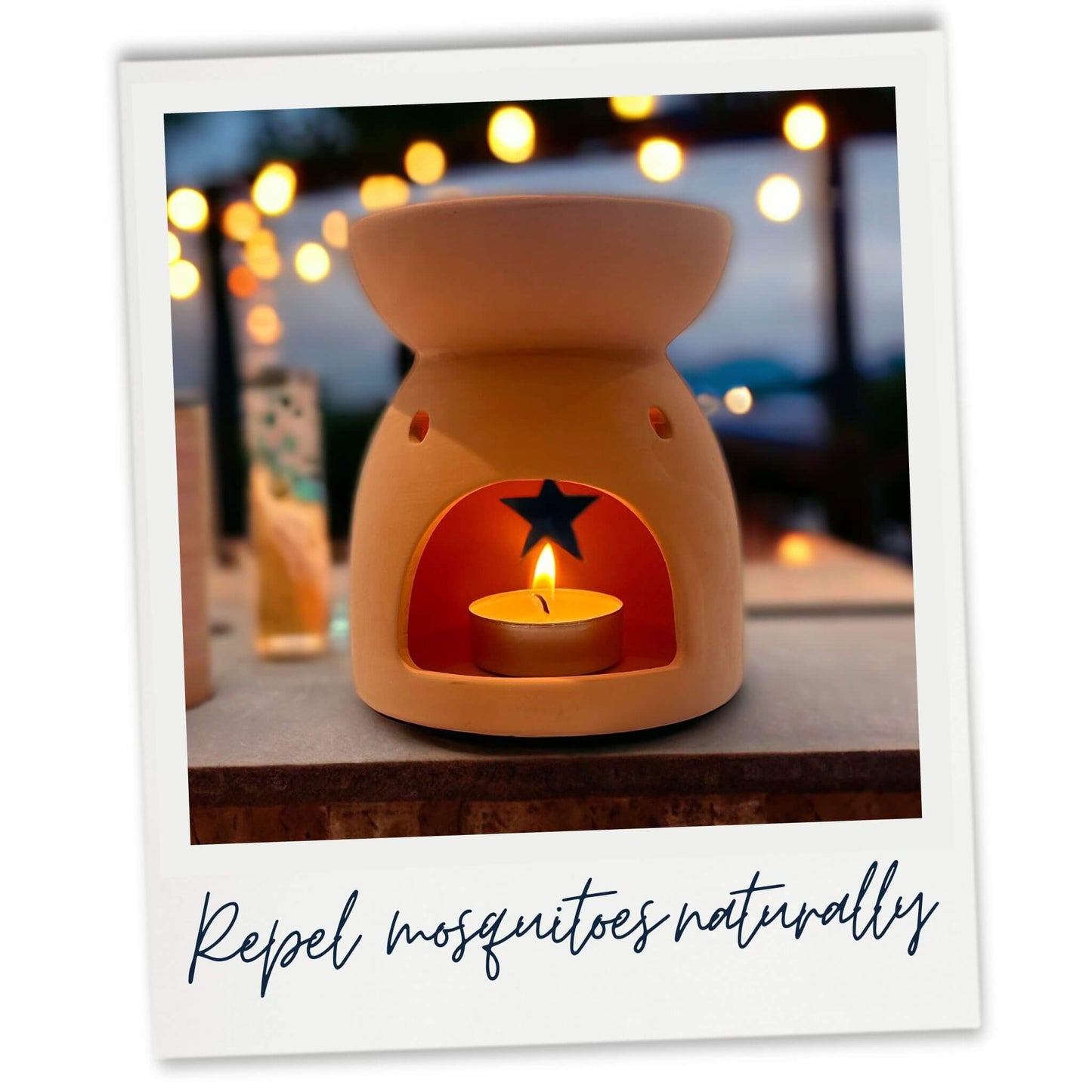 Terracotta star outdoor wax melter in a garden bar at night