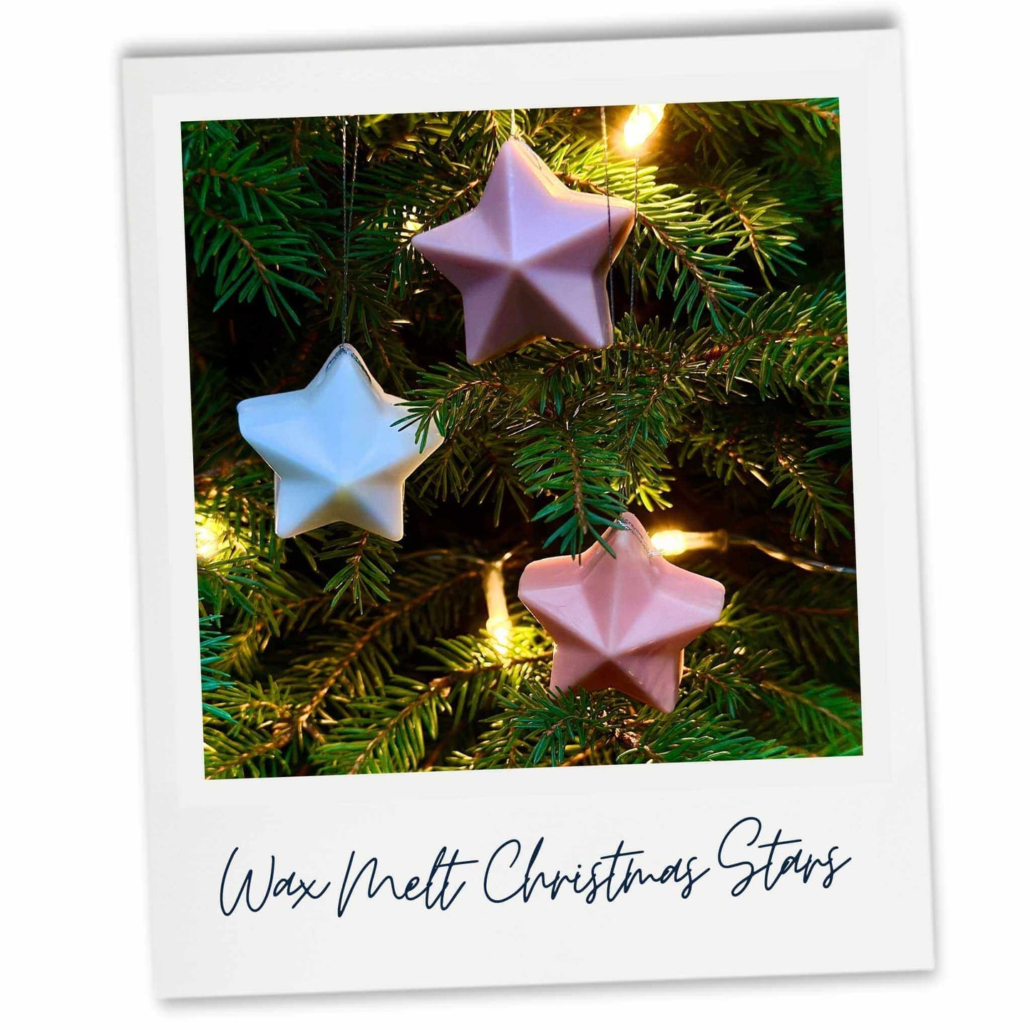 Wax melt Christmas star decorations on a Christmas tree with warm glow