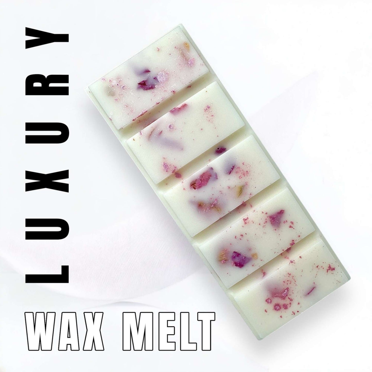 Luxury wax melts with botanicals on a white background, labeled 'Luxury Wax Melt'.