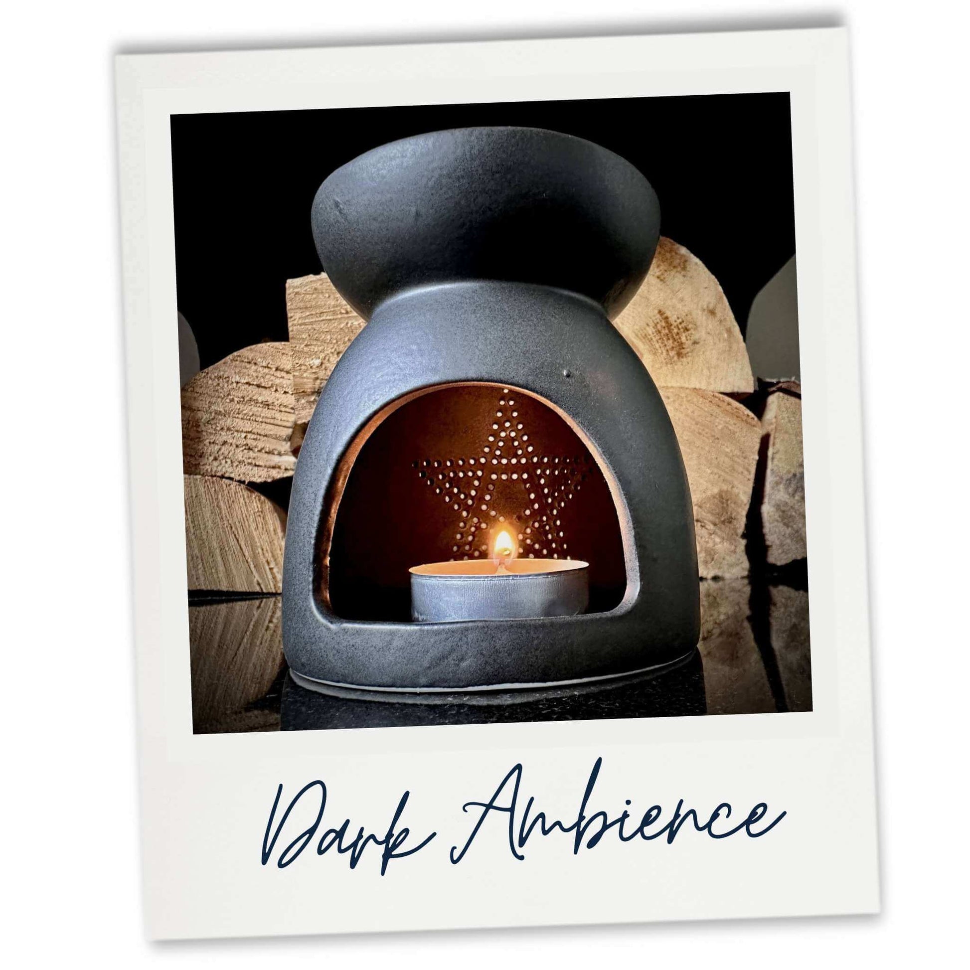 Black wax melt burner in fireplace