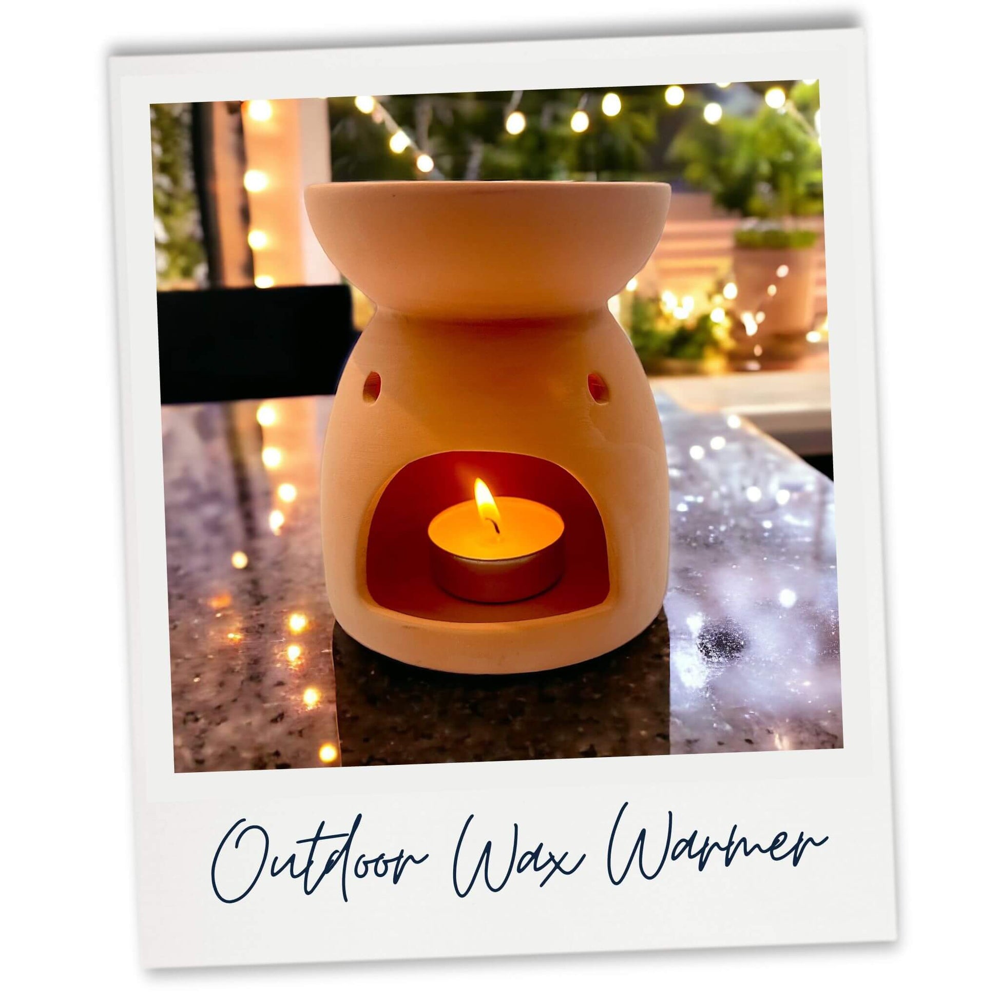 Garden wax melt burner at night with fairy lights