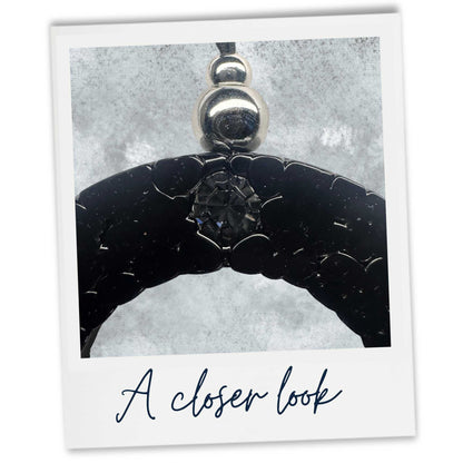 A close up look at our Lemongrass car freshener with Black Czech crystal and silver coloured beading