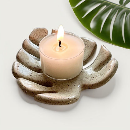 Monstera leaf heart tealight holder with a lit candle life style image