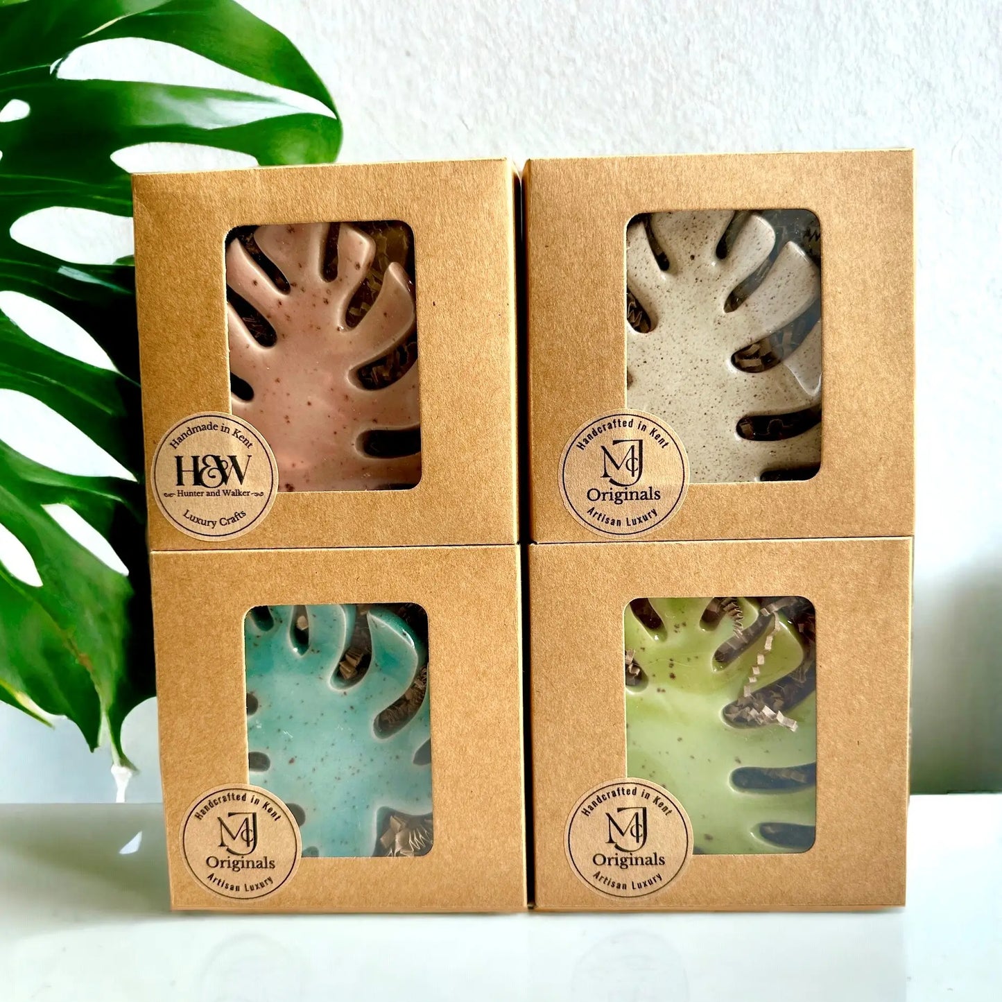 Monstera lover luxury tealight holders showing the different colour options of pink, cream, blue and green
