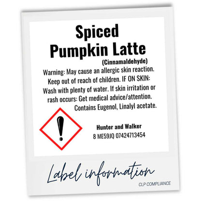A CLP product label for 'Spiced Pumpkin Latte' by Hunter and Walker, featuring a white background with black text, a red warning diamond icon, and a white border resembling a Polaroid-style photo frame.