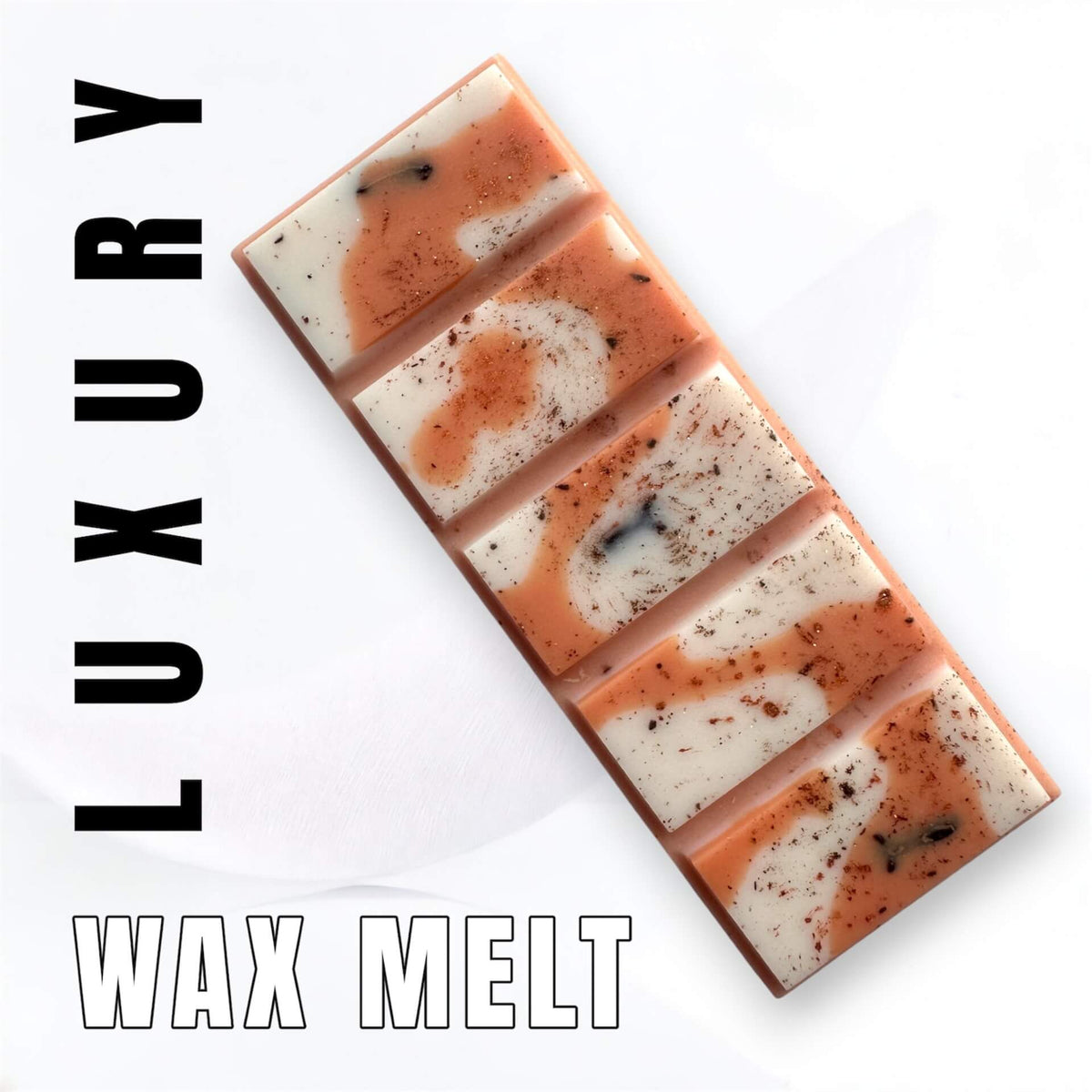 Spiced Pumpkin Latte wax melt with alternating swirled sections of peach-orange and off-white, speckled with dark flecks, shown on a white background with vertical 'LUXURY' text on the left and 'WAX MELT' text at the bottom.