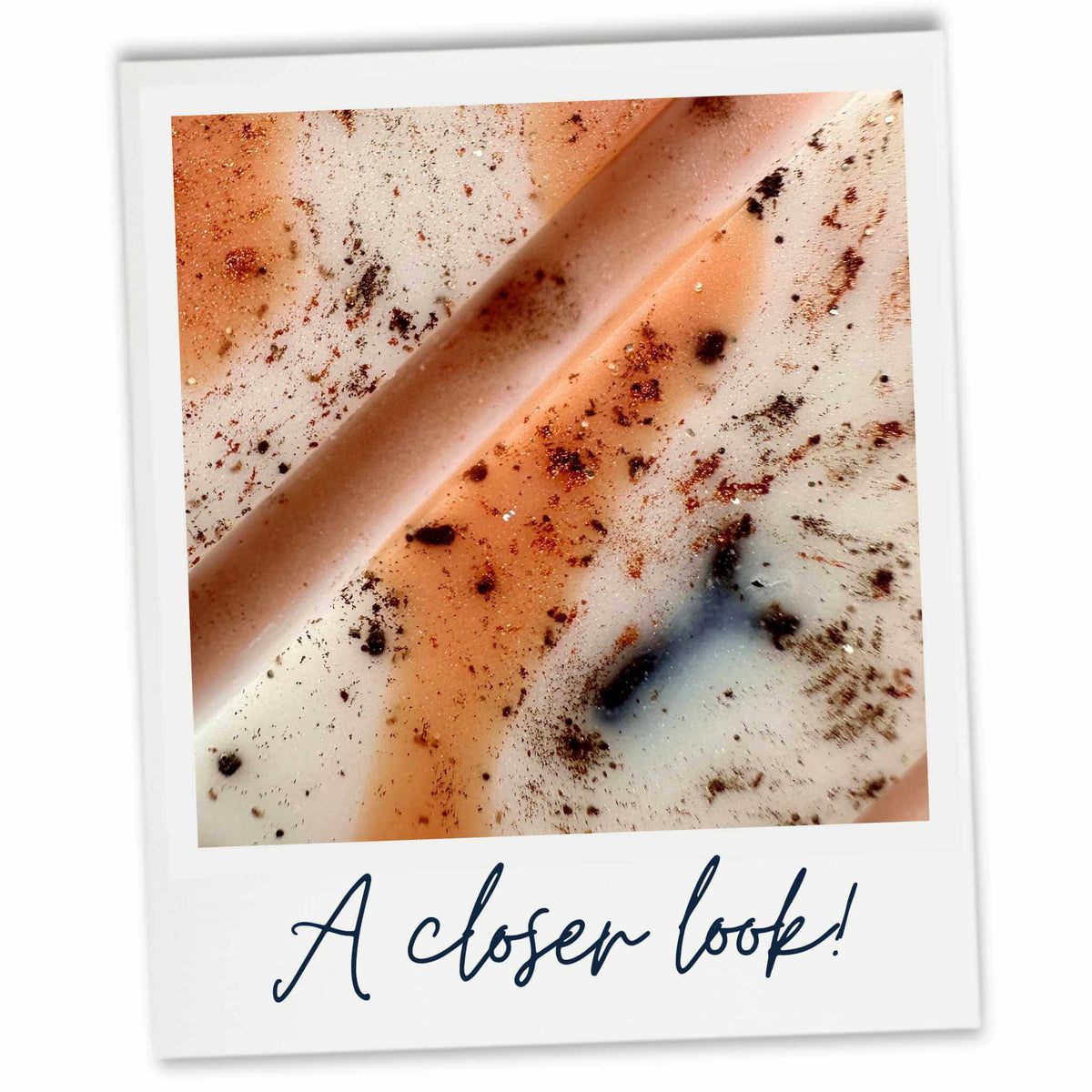 A close-up view of a Spiced Punpkin Latte wax melt presented inside a white polaroid-style frame with the text 'A closer look!' at the bottom.